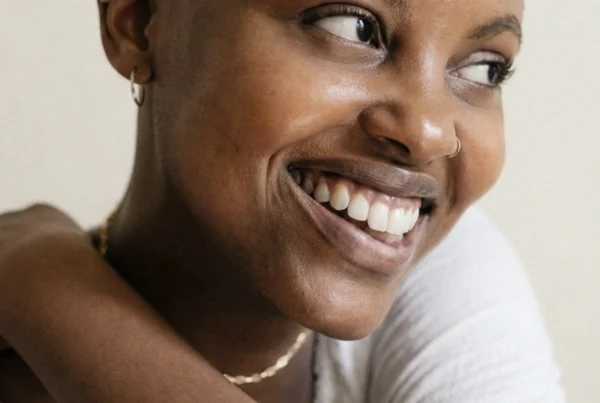 Portrait of Ariel, a certified birth doula based in Harlem, supporting families across New York City.