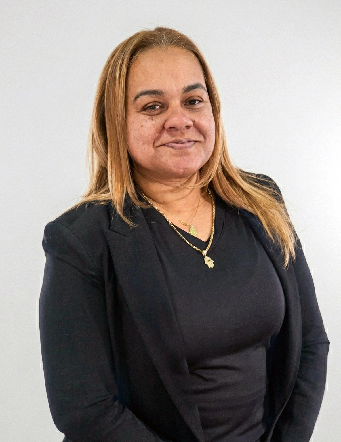 Portrait of Daisy, a certified postpartum and birth doula based in New Rochelle, serving families across NYC and surrounding areas.