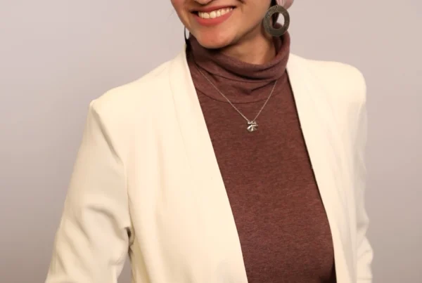 Portrait of Fifaa, a certified doula and dietitian providing pregnancy and postpartum support with a holistic wellness approach.