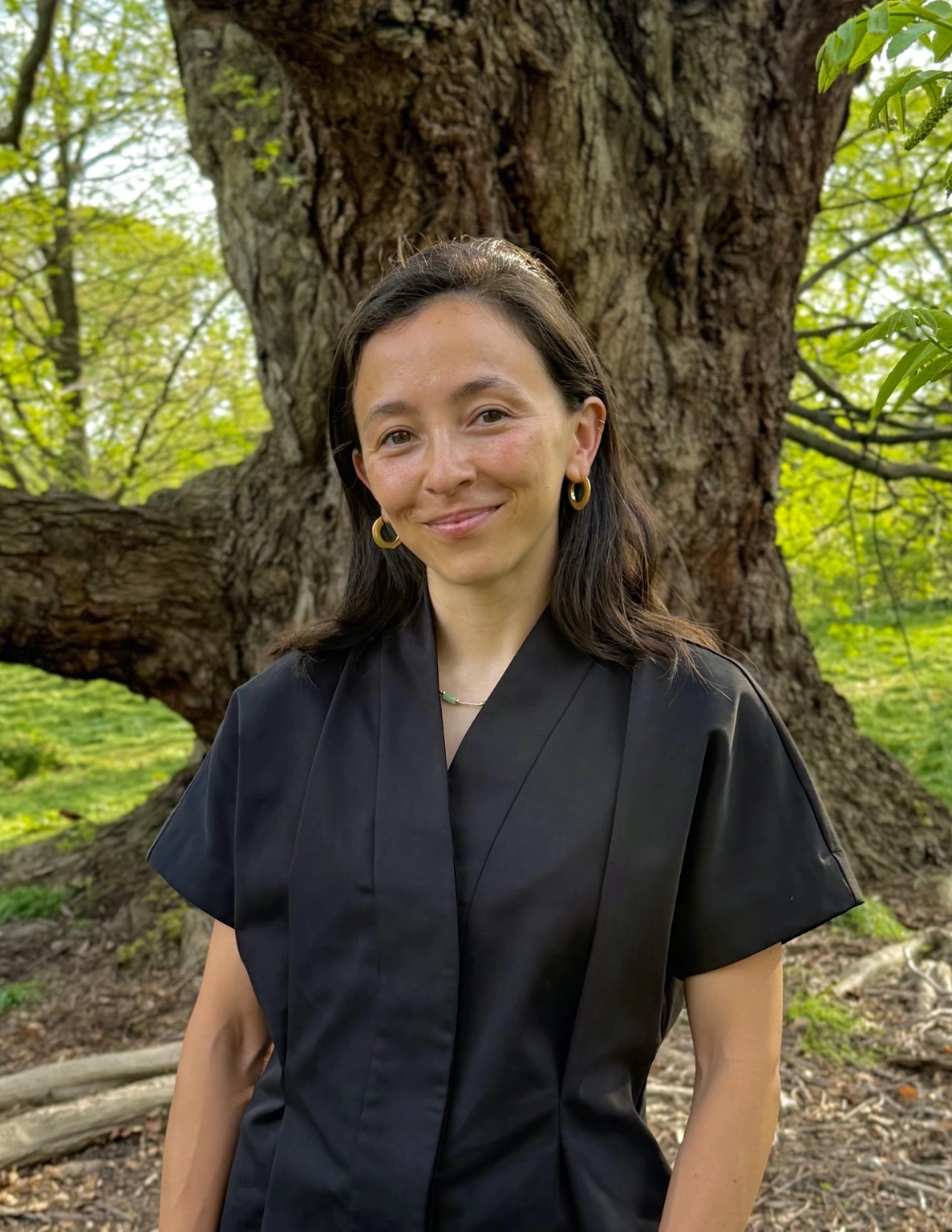Portrait of Liz, a birth and postpartum doula providing compassionate, inclusive support for families throughout pregnancy, birth, and postpartum.