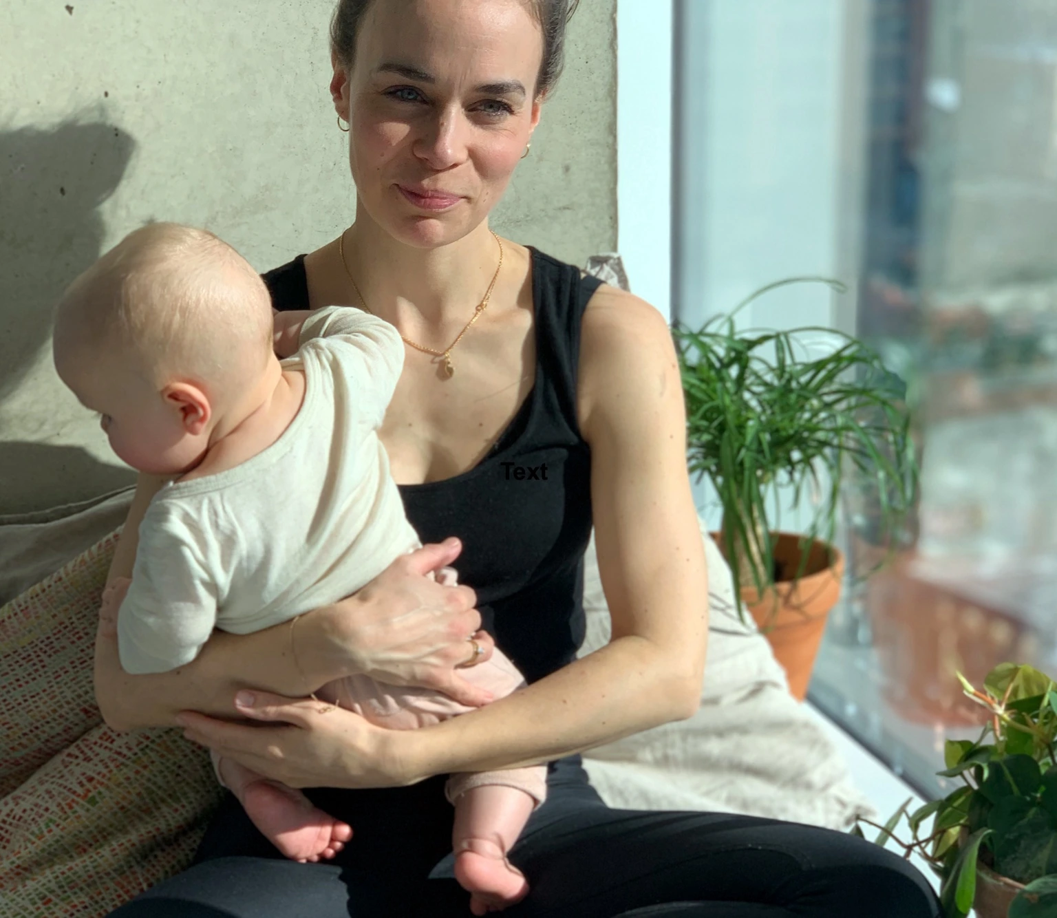 Sabina Grabow, founder of NYC Doula Base, with her baby